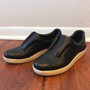 Black leather slip on sneakers by COS